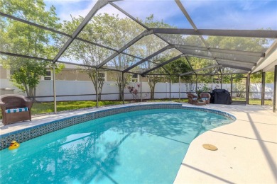 Beautifully maintained 3-bedroom, 2-bath pool home in the on East Lake Woodlands Country Club in Florida - for sale on GolfHomes.com, golf home, golf lot