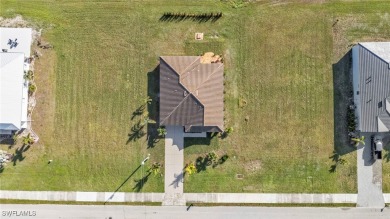 LIKE-NEW CONSTRUCTION IN A GOLF CART-FRIENDLY COMMUNITY! on Burnt Store Golf Club in Florida - for sale on GolfHomes.com, golf home, golf lot