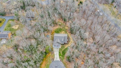 Discover the charm of this custom-built Craftsman home at Mt on Mountain Aire Golf Course in North Carolina - for sale on GolfHomes.com, golf home, golf lot