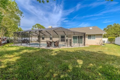Beautifully maintained 3-bedroom, 2-bath pool home in the on East Lake Woodlands Country Club in Florida - for sale on GolfHomes.com, golf home, golf lot