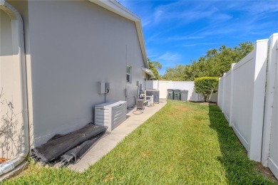 Beautifully maintained 3-bedroom, 2-bath pool home in the on East Lake Woodlands Country Club in Florida - for sale on GolfHomes.com, golf home, golf lot