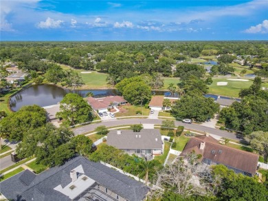 Beautifully maintained 3-bedroom, 2-bath pool home in the on East Lake Woodlands Country Club in Florida - for sale on GolfHomes.com, golf home, golf lot