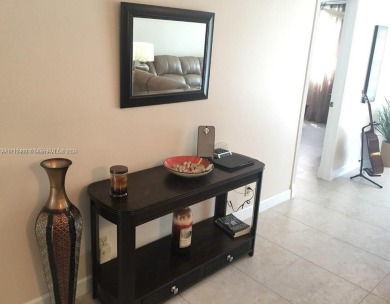HOLLYBROOK IS A PRESTIGIOUS COMMUNITY NESTED IN SOUTH BROWARD on Hollybrook Golf and Tennis Club  in Florida - for sale on GolfHomes.com, golf home, golf lot