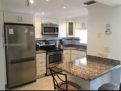 HOLLYBROOK IS A PRESTIGIOUS COMMUNITY NESTED IN SOUTH BROWARD on Hollybrook Golf and Tennis Club  in Florida - for sale on GolfHomes.com, golf home, golf lot
