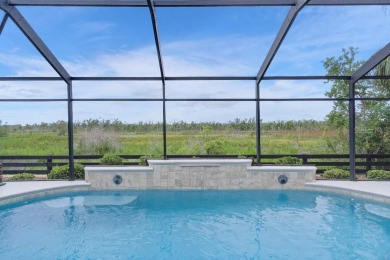 This expanded designer LAUREL OAK home features 3 bedrooms and 2 on Bella Glade Country Club in Florida - for sale on GolfHomes.com, golf home, golf lot
