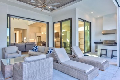 Stunning custom residence offering picturesque lake and on Miromar Lakes Golf Club in Florida - for sale on GolfHomes.com, golf home, golf lot