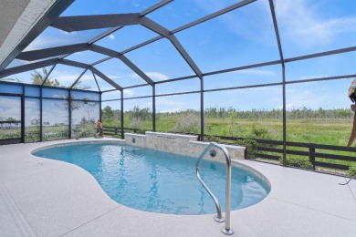 This expanded designer LAUREL OAK home features 3 bedrooms and 2 on Bella Glade Country Club in Florida - for sale on GolfHomes.com, golf home, golf lot