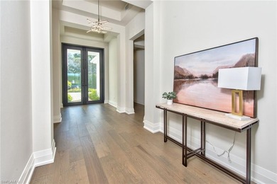 Stunning custom residence offering picturesque lake and on Miromar Lakes Golf Club in Florida - for sale on GolfHomes.com, golf home, golf lot