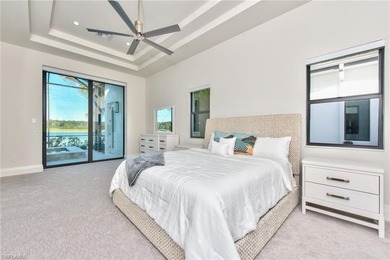 Stunning custom residence offering picturesque lake and on Miromar Lakes Golf Club in Florida - for sale on GolfHomes.com, golf home, golf lot