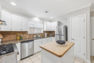 558 Quail Court is a beautiful brick home situated on a wooded on Long Bay Club in South Carolina - for sale on GolfHomes.com, golf home, golf lot