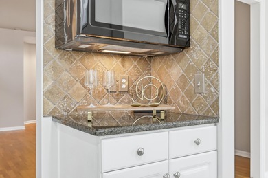 558 Quail Court is a beautiful brick home situated on a wooded on Long Bay Club in South Carolina - for sale on GolfHomes.com, golf home, golf lot