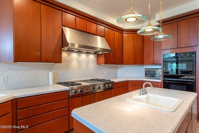 This is a gorgeous brick, 3-bedroom, 4 full-bathroom home in The on Sound Golf Links at Albemarle Plantation in North Carolina - for sale on GolfHomes.com, golf home, golf lot