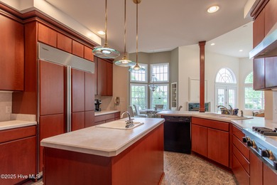 This is a gorgeous brick, 3-bedroom, 4 full-bathroom home in The on Sound Golf Links at Albemarle Plantation in North Carolina - for sale on GolfHomes.com, golf home, golf lot