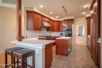 This is a gorgeous brick, 3-bedroom, 4 full-bathroom home in The on Sound Golf Links at Albemarle Plantation in North Carolina - for sale on GolfHomes.com, golf home, golf lot