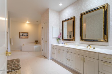 This is a gorgeous brick, 3-bedroom, 4 full-bathroom home in The on Sound Golf Links at Albemarle Plantation in North Carolina - for sale on GolfHomes.com, golf home, golf lot