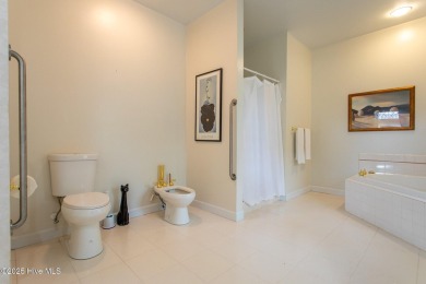 This is a gorgeous brick, 3-bedroom, 4 full-bathroom home in The on Sound Golf Links at Albemarle Plantation in North Carolina - for sale on GolfHomes.com, golf home, golf lot