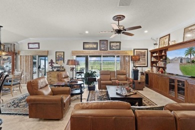 This expanded designer LAUREL OAK home features 3 bedrooms and 2 on Bella Glade Country Club in Florida - for sale on GolfHomes.com, golf home, golf lot