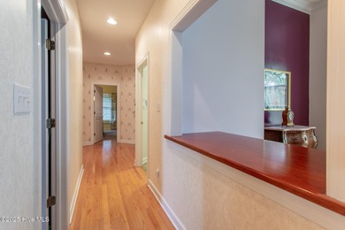 This is a gorgeous brick, 3-bedroom, 4 full-bathroom home in The on Sound Golf Links at Albemarle Plantation in North Carolina - for sale on GolfHomes.com, golf home, golf lot