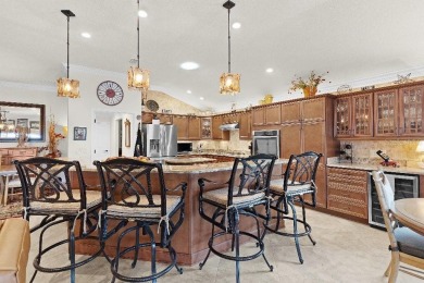 This expanded designer LAUREL OAK home features 3 bedrooms and 2 on Bella Glade Country Club in Florida - for sale on GolfHomes.com, golf home, golf lot