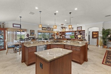 This expanded designer LAUREL OAK home features 3 bedrooms and 2 on Bella Glade Country Club in Florida - for sale on GolfHomes.com, golf home, golf lot