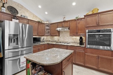 This expanded designer LAUREL OAK home features 3 bedrooms and 2 on Bella Glade Country Club in Florida - for sale on GolfHomes.com, golf home, golf lot