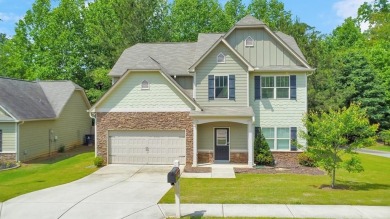 Welcome to this beautifully maintained 4 bedroom, 3 bathroom on Mirror Lake Golf Club in Georgia - for sale on GolfHomes.com, golf home, golf lot