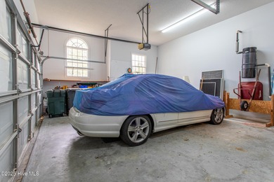 This is a gorgeous brick, 3-bedroom, 4 full-bathroom home in The on Sound Golf Links at Albemarle Plantation in North Carolina - for sale on GolfHomes.com, golf home, golf lot