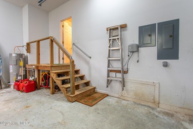 This is a gorgeous brick, 3-bedroom, 4 full-bathroom home in The on Sound Golf Links at Albemarle Plantation in North Carolina - for sale on GolfHomes.com, golf home, golf lot