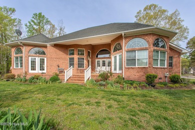 This is a gorgeous brick, 3-bedroom, 4 full-bathroom home in The on Sound Golf Links at Albemarle Plantation in North Carolina - for sale on GolfHomes.com, golf home, golf lot