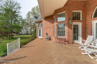 This is a gorgeous brick, 3-bedroom, 4 full-bathroom home in The on Sound Golf Links at Albemarle Plantation in North Carolina - for sale on GolfHomes.com, golf home, golf lot