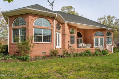 This is a gorgeous brick, 3-bedroom, 4 full-bathroom home in The on Sound Golf Links at Albemarle Plantation in North Carolina - for sale on GolfHomes.com, golf home, golf lot