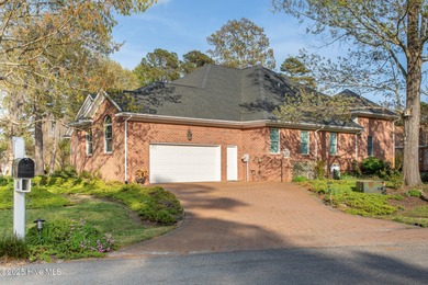 This is a gorgeous brick, 3-bedroom, 4 full-bathroom home in The on Sound Golf Links at Albemarle Plantation in North Carolina - for sale on GolfHomes.com, golf home, golf lot
