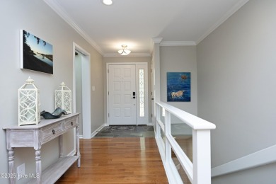 This exceptional lakefront home, located in Seven Lakes West on Beacon Ridge Golf and Country Club in North Carolina - for sale on GolfHomes.com, golf home, golf lot