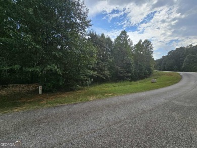 Located on North Edgewater Trail within the gated Currahee Club on Currahee Golf Club in Georgia - for sale on GolfHomes.com, golf home, golf lot
