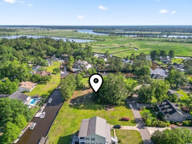Nestled at the end of a peaceful cul-de-sac in the heart of on Wedgefield Plantation Golf Club in South Carolina - for sale on GolfHomes.com, golf home, golf lot