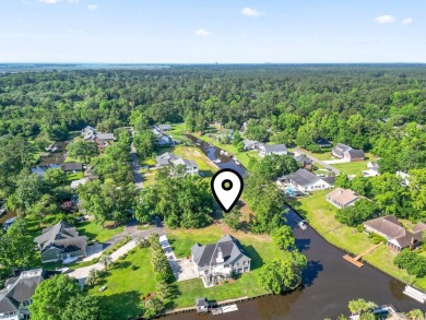 Nestled at the end of a peaceful cul-de-sac in the heart of on Wedgefield Plantation Golf Club in South Carolina - for sale on GolfHomes.com, golf home, golf lot
