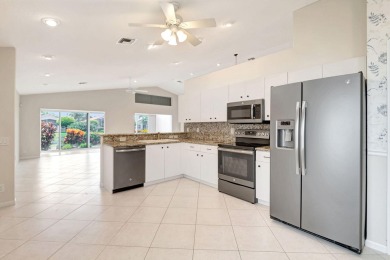 An amazing opportunity to own a Cypress model with a WATERVIEW on Westchester Golf and Country Club in Florida - for sale on GolfHomes.com, golf home, golf lot