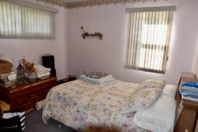 Welcome to this delightful two-bedroom, two-bath ranch-style on Sibley Golf And Country Club in Iowa - for sale on GolfHomes.com, golf home, golf lot