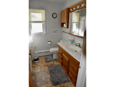 Welcome to this delightful two-bedroom, two-bath ranch-style on Sibley Golf And Country Club in Iowa - for sale on GolfHomes.com, golf home, golf lot