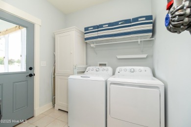 This beautifully appointed former contractor model home is on The Carolina Club in North Carolina - for sale on GolfHomes.com, golf home, golf lot