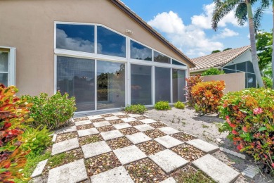 An amazing opportunity to own a Cypress model with a WATERVIEW on Westchester Golf and Country Club in Florida - for sale on GolfHomes.com, golf home, golf lot