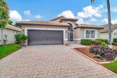 An amazing opportunity to own a Cypress model with a WATERVIEW on Westchester Golf and Country Club in Florida - for sale on GolfHomes.com, golf home, golf lot