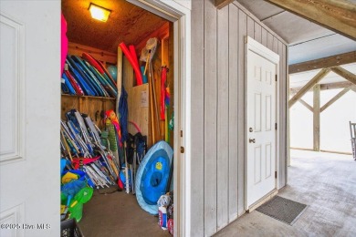 True Beach Beauty in a Superb Location across the street from on Sea Trail Golf Resort in North Carolina - for sale on GolfHomes.com, golf home, golf lot