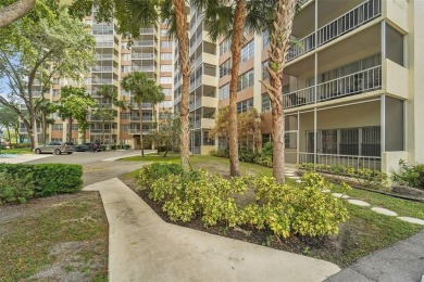 BEAUTIFUL CITY VIEWS FROM THIS UPDATED 2 BEDROOM 2 BATHROOM on Country Club of Coral Springs in Florida - for sale on GolfHomes.com, golf home, golf lot