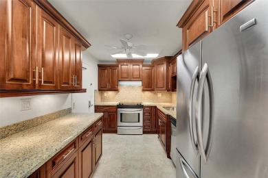 BEAUTIFUL CITY VIEWS FROM THIS UPDATED 2 BEDROOM 2 BATHROOM on Country Club of Coral Springs in Florida - for sale on GolfHomes.com, golf home, golf lot