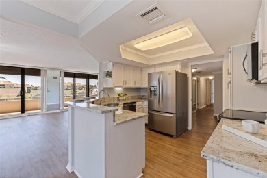 Under contract-accepting backup offers. Explore the tranquility on Pasadena Yacht and Country Club in Florida - for sale on GolfHomes.com, golf home, golf lot