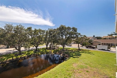Under contract-accepting backup offers. Explore the tranquility on Pasadena Yacht and Country Club in Florida - for sale on GolfHomes.com, golf home, golf lot