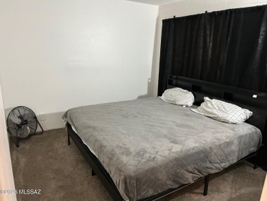 Move-in ready 2 bedroom 1 bathroom coop with newer A/C unit on Randolph Park Golf Courses in Arizona - for sale on GolfHomes.com, golf home, golf lot