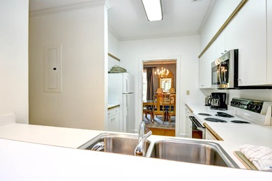 Beautifully Renovated Condo with Golf Course Views in Pawleys on Pawleys Plantation Golf and Country Club in South Carolina - for sale on GolfHomes.com, golf home, golf lot