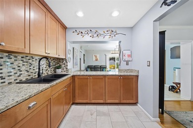 Under contract-accepting backup offers. GOLFLAND OF TAMPA'S on Babe Zaharias Golf Course in Florida - for sale on GolfHomes.com, golf home, golf lot